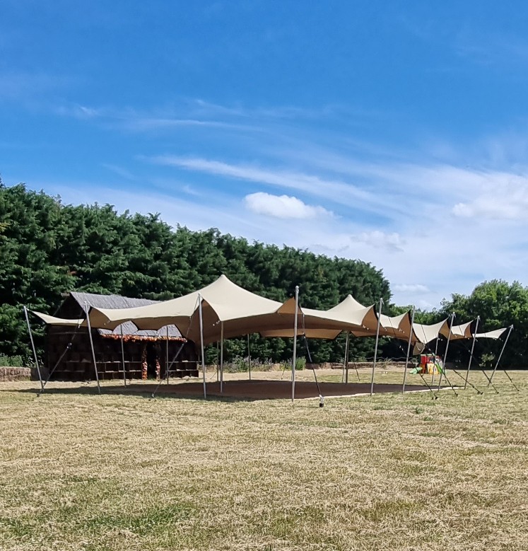 10.5Mx15M_lofted_stretch_tent.jpg